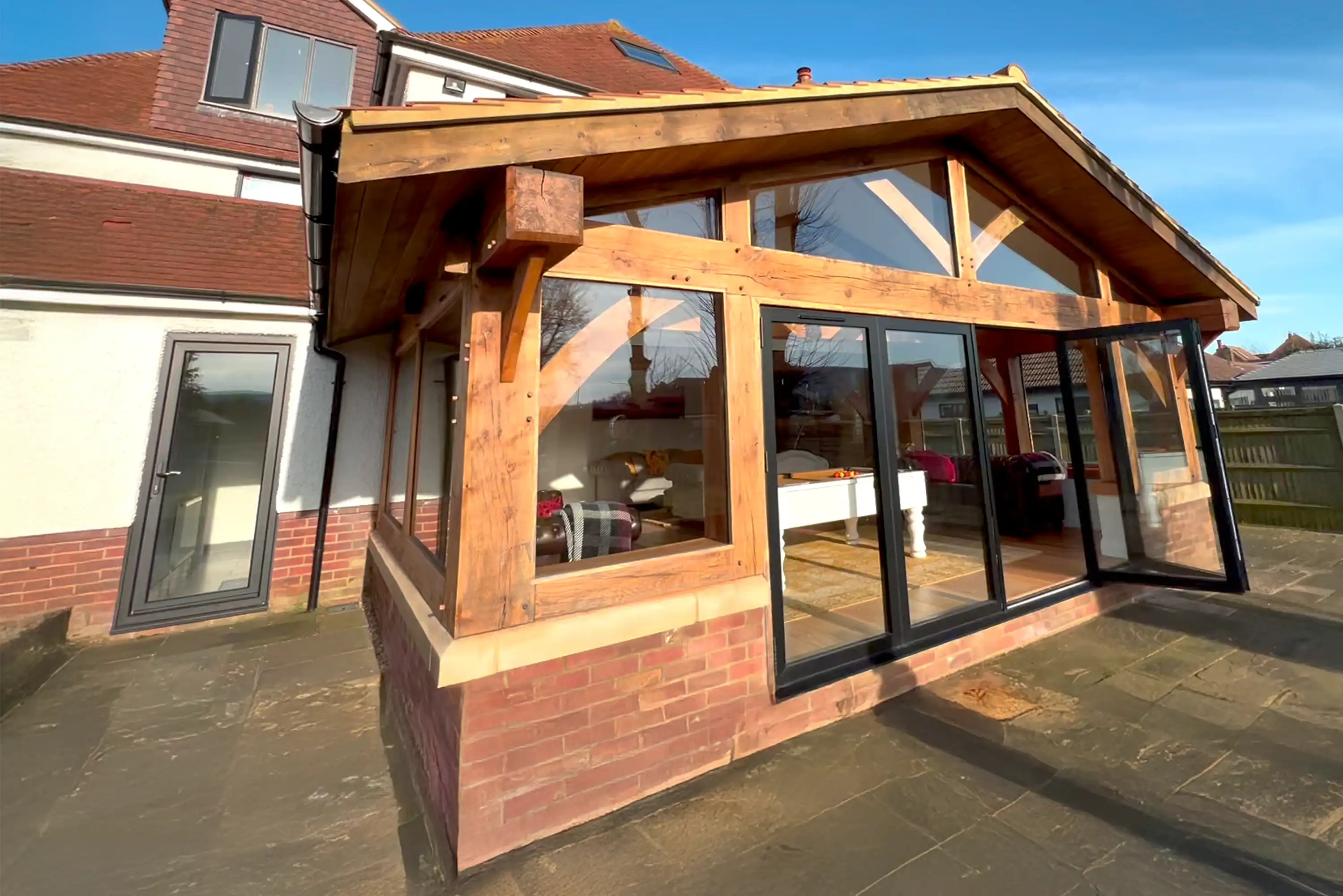A house with a wooden roof and windows.